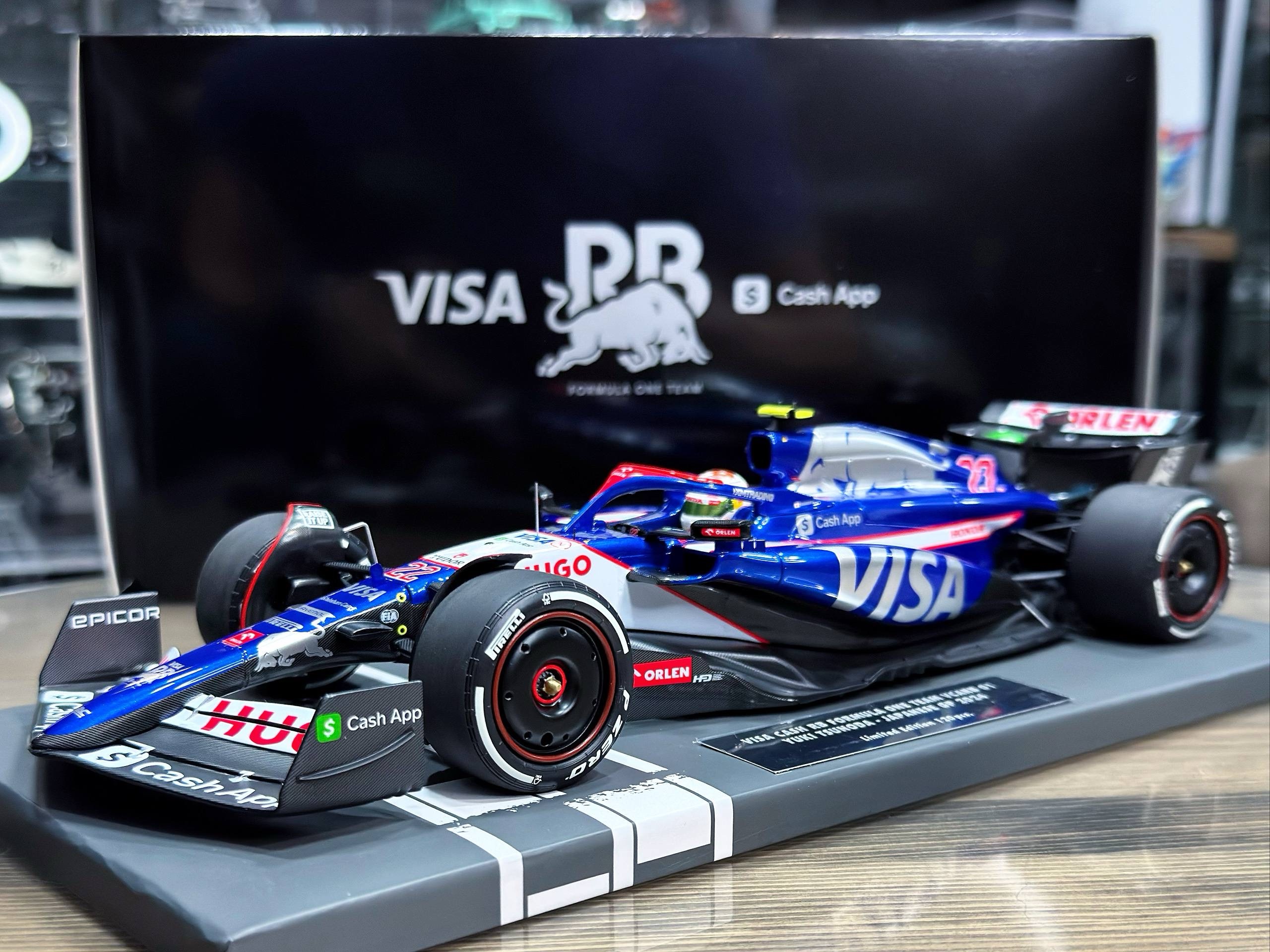 117240422 Minichamps Visa Cash Red Bull Formula One Team VCARB 01 Yuki Tsunoda Japanese GP 2024 1:18