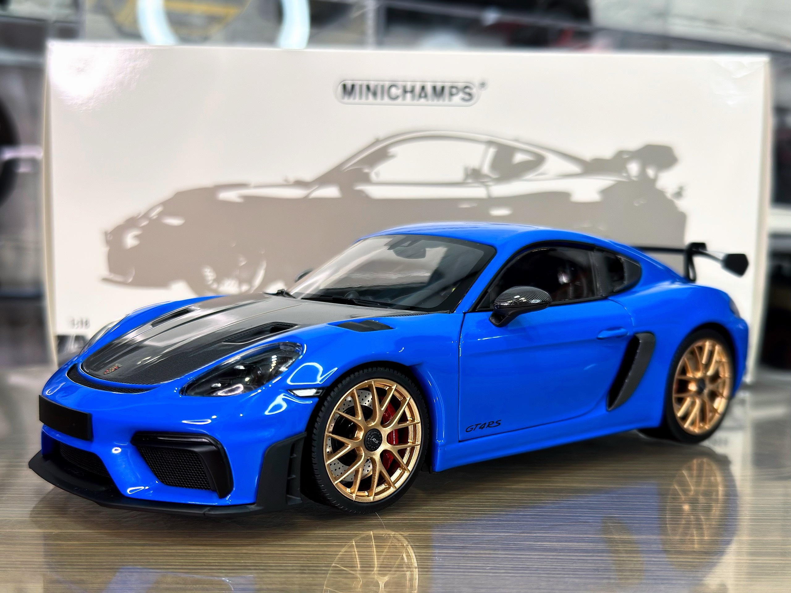 110062121 Minichamps Porsche Cayman GT4 RS Blue W/Weissach Package 1:18