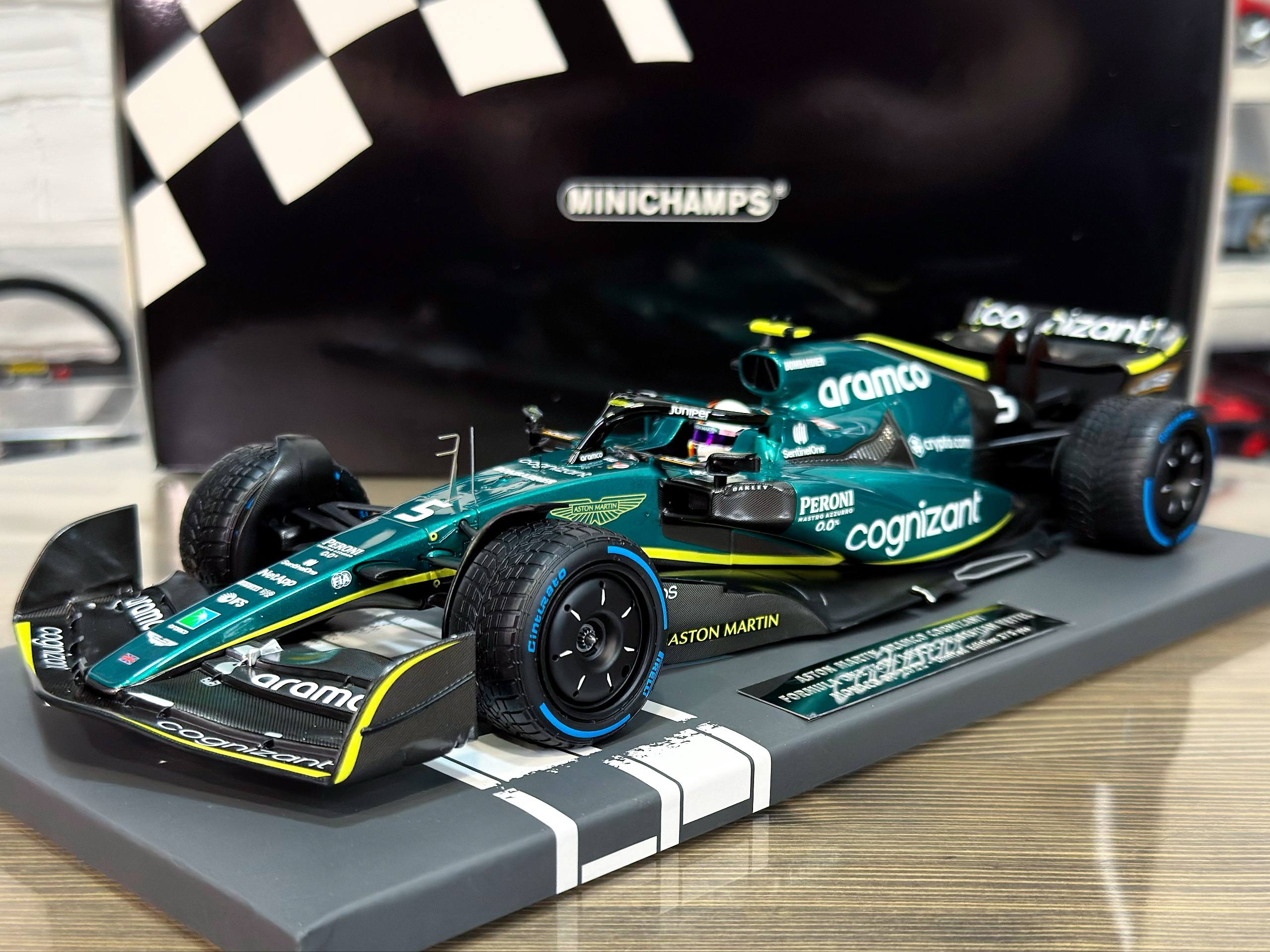 117220305 Minichamps Aston Martin Aramco Cognizant Formula One Team AMR22 Sebastian Vettel Monaco GP 2022 1:18