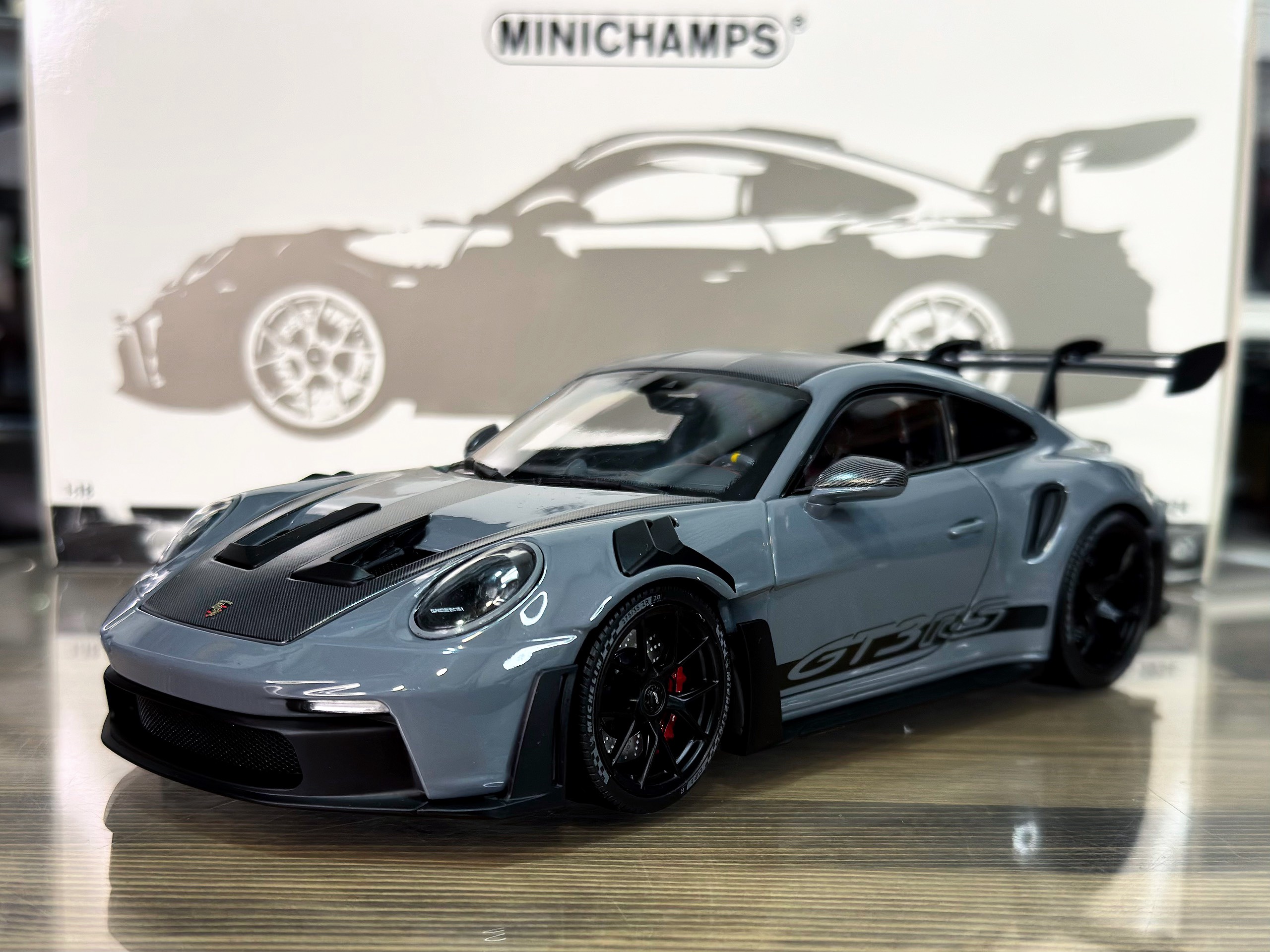 110062024 Minichamps Porsche 911 (992) GT3RS 2024 Grey/Weissach Package/Black Wheels 1:18